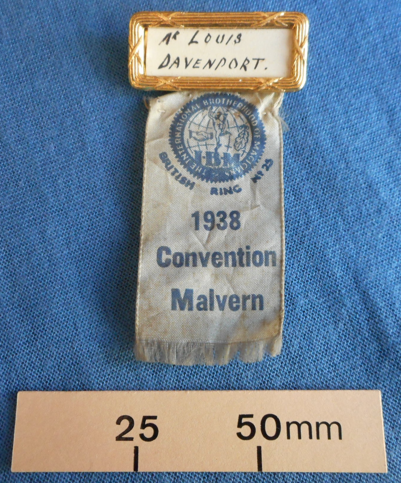 Badge and ribbon for the IBM British Ring convention in Malvern, 1938