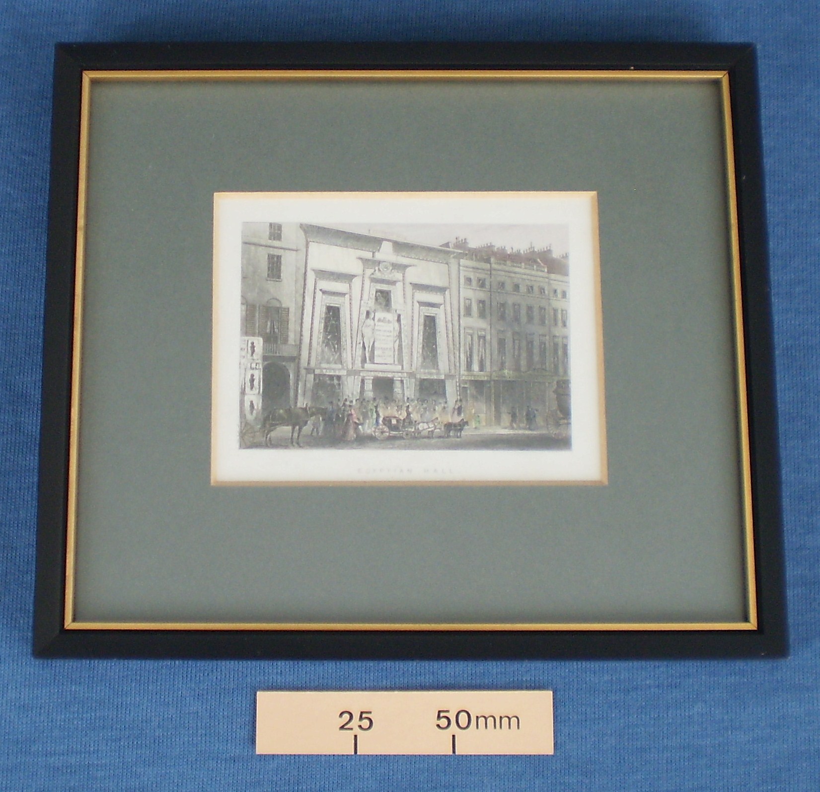 Framed hand tinted print of the Egyptian Hall (Bullock’s Museum) on Piccadilly, London