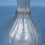 A quartered decanter to store four drinks