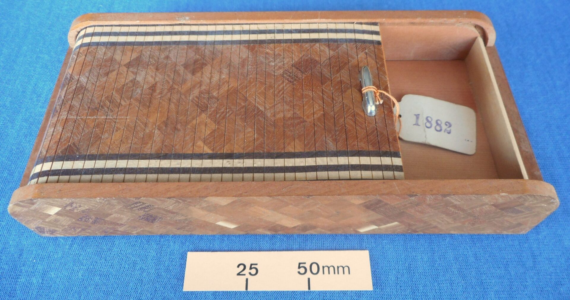 Japanese novelty cigarette box with roll top lid