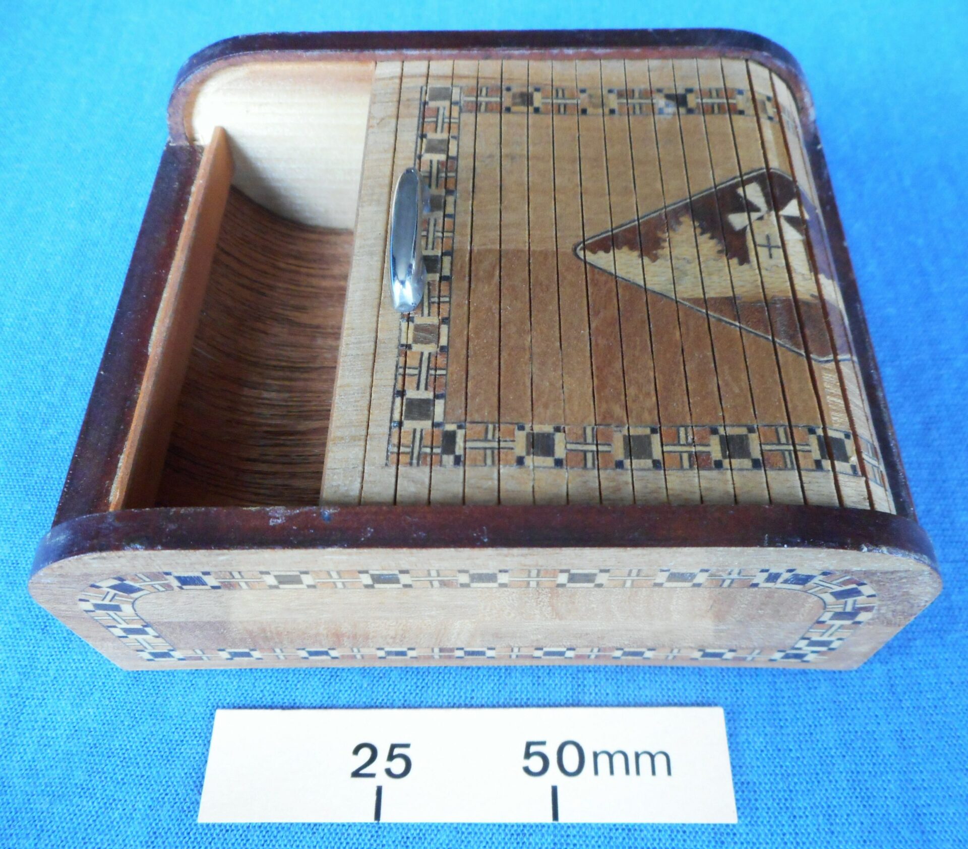 Japanese novelty cigarette box with roll top lid