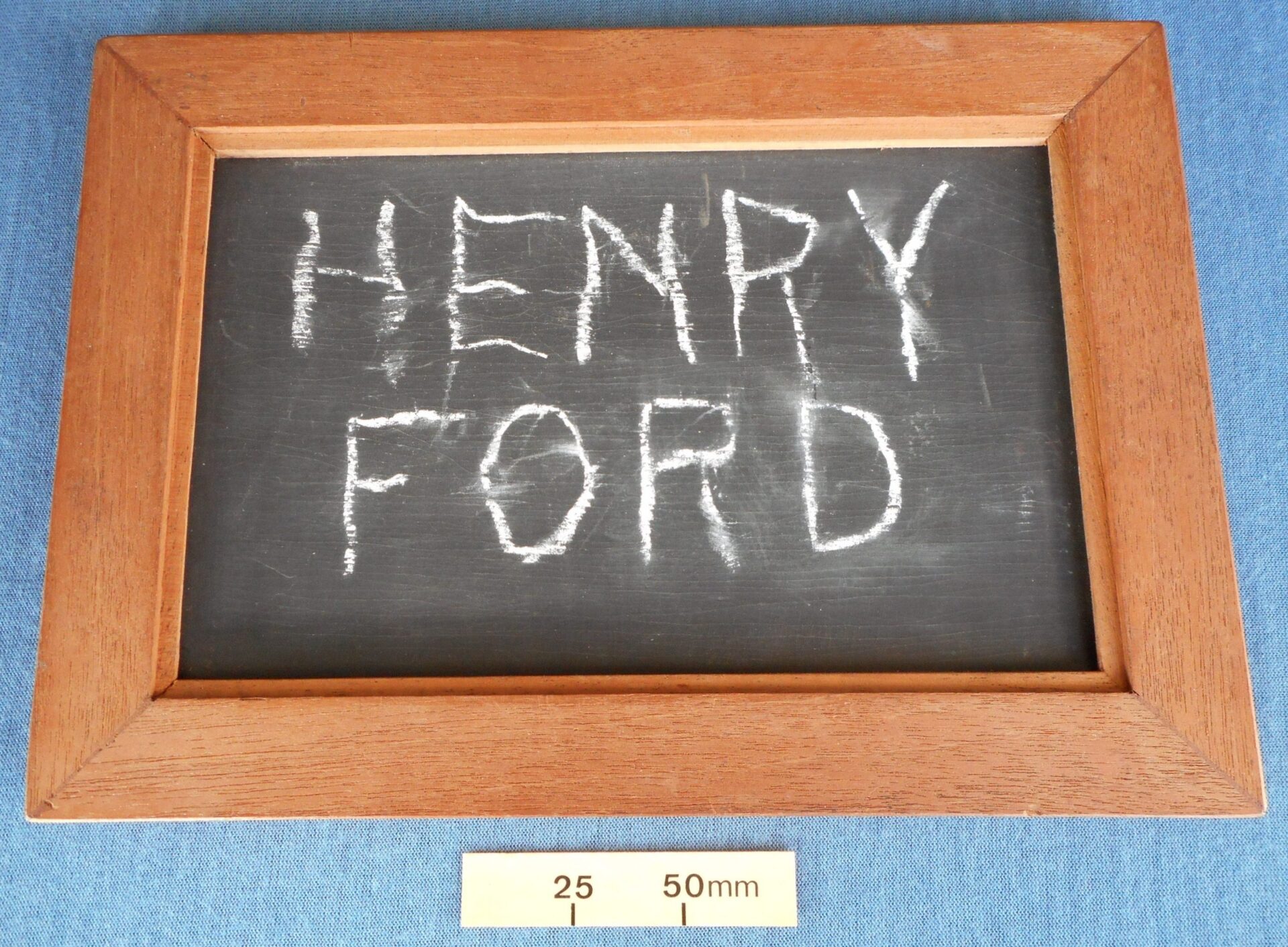 Slate used by magicians to produce writing using chalk