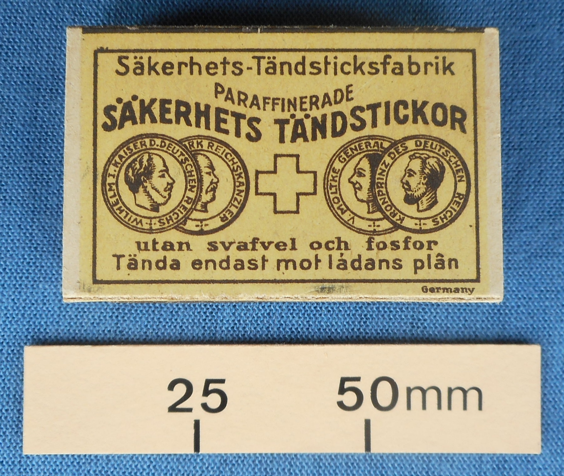 Joke matchbox which traps your fingers when you pick it up