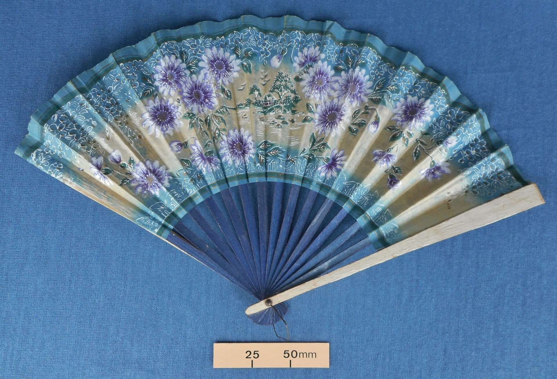 Paper and wood fan