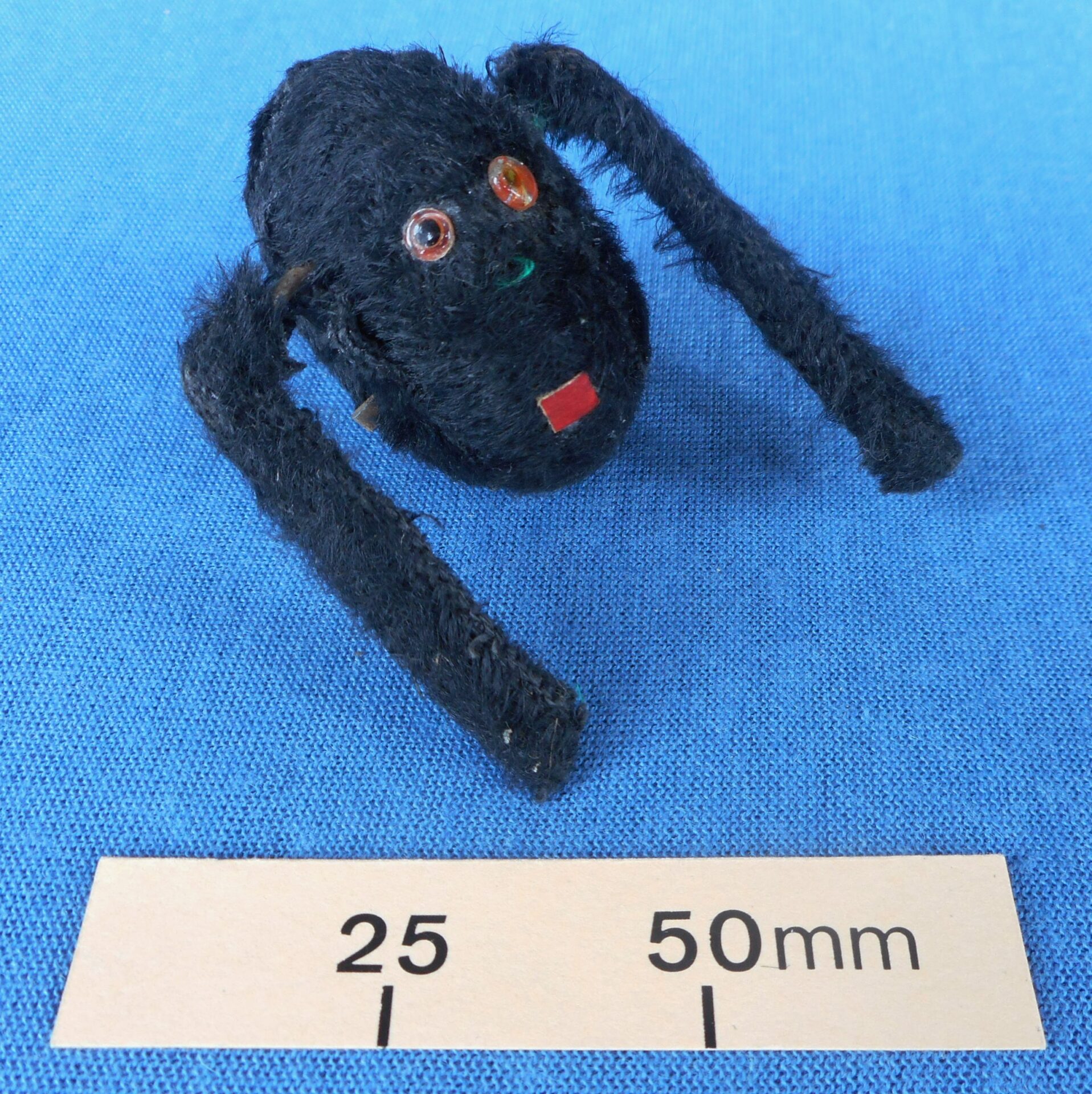 Clockwork monster novelty with two spinning legs