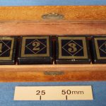 Divination of numbered blocks in a wooden box