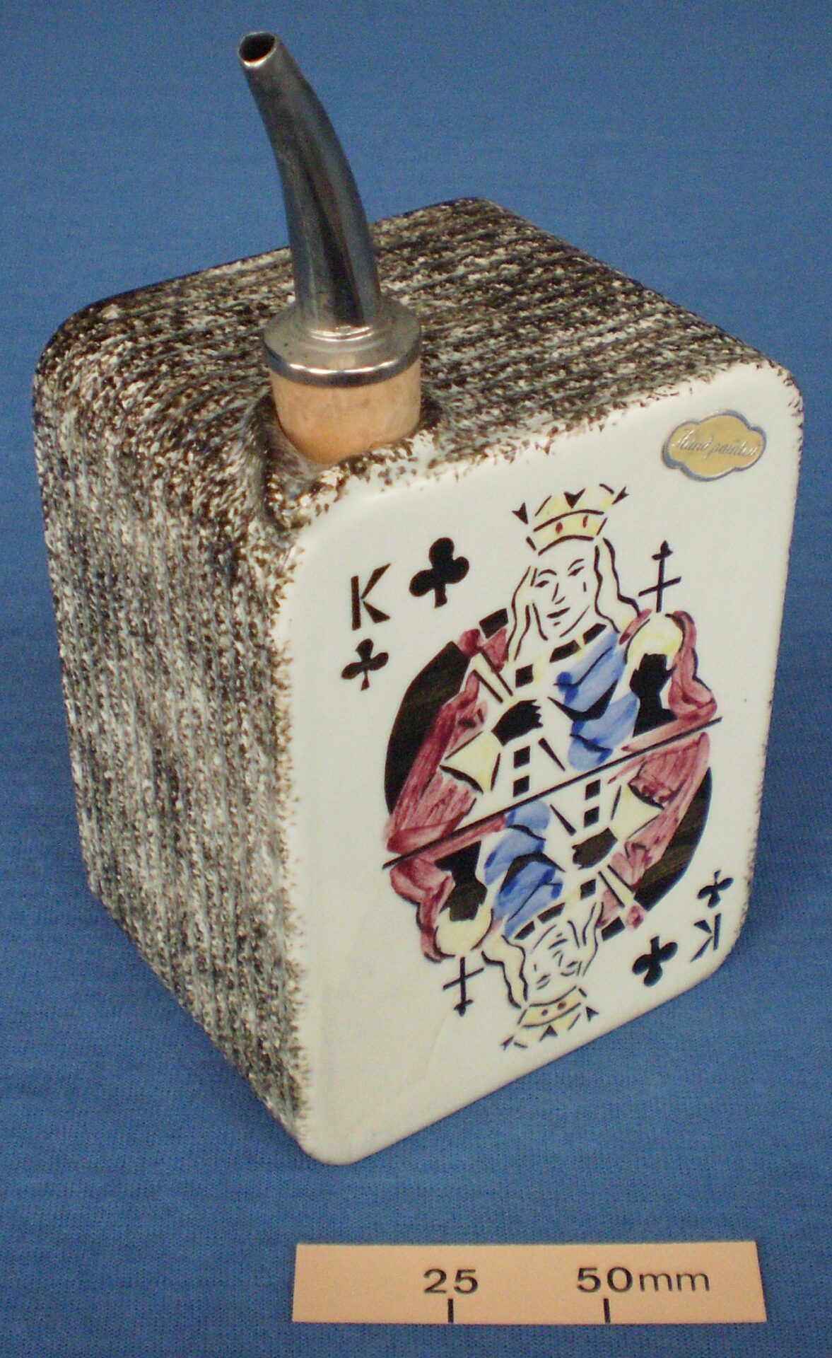 Ceramic decanter designed to look like a pack of cards