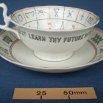 The “Nelros” Cup of Fortune. Cup & saucer with instruction book