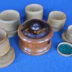 Turned wooden nest of boxes