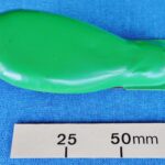 Green metal noise maker