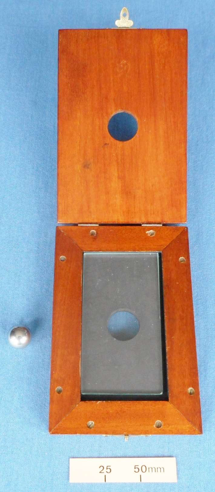 The “Miracle” Steel Ball Thro’ Glass Trick