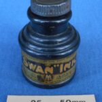 Magic trick with a bottle of “Swan” Blue Black Ink