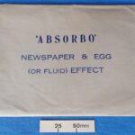 ‘Absorbo’ newspaper and egg (or fluid) effect