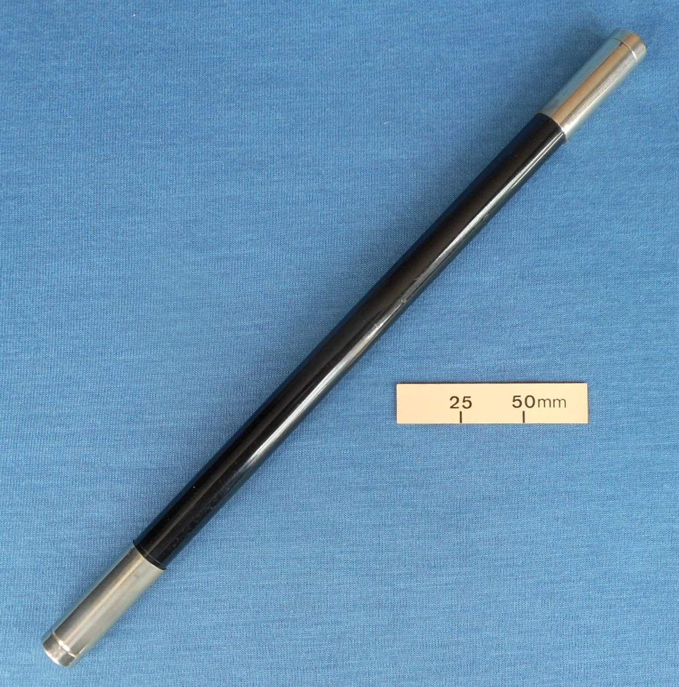 Wand for vanishing a spread of cards